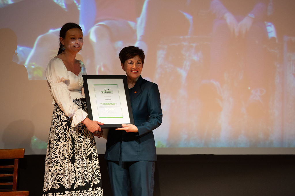Nicola Biss receives her award from Dame Patsy Reddy
